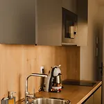 アパートホテル Eszentrico Suites-rooftop Bar & Pool 4*